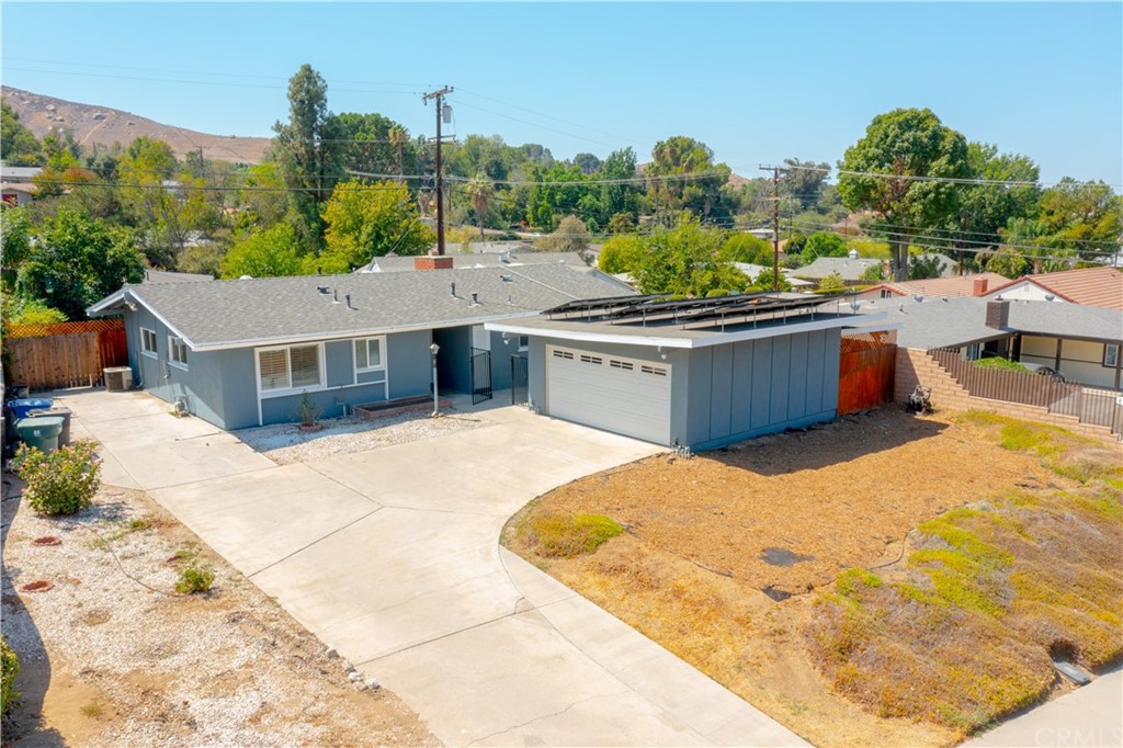 166 Barret Road Riverside, CA 92507 - Photo 26 of 30 a view of a swimming pool with an outdoor seating