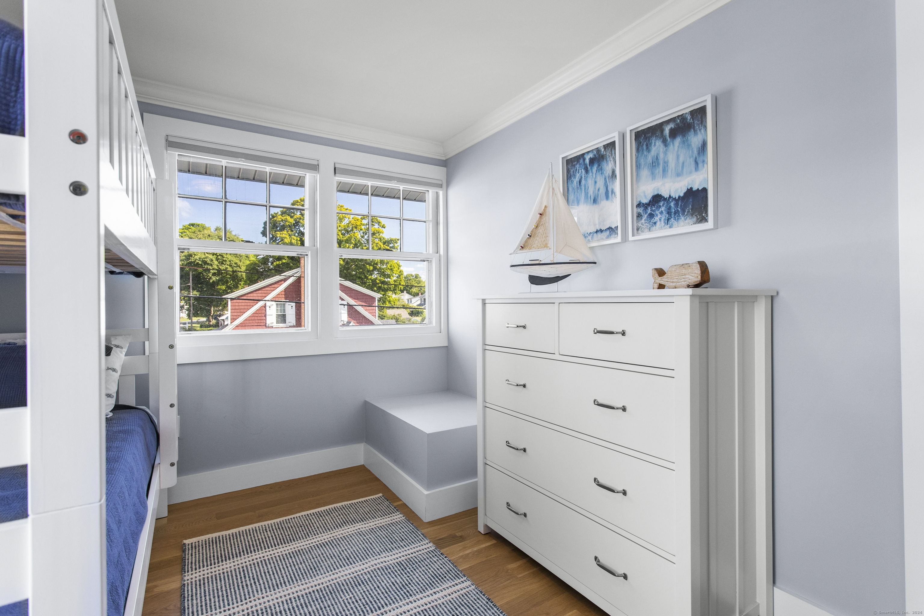 15 Cottage Road Old Lyme, CT 06371 - Photo 19 of 26 a bedroom with a bed and a window