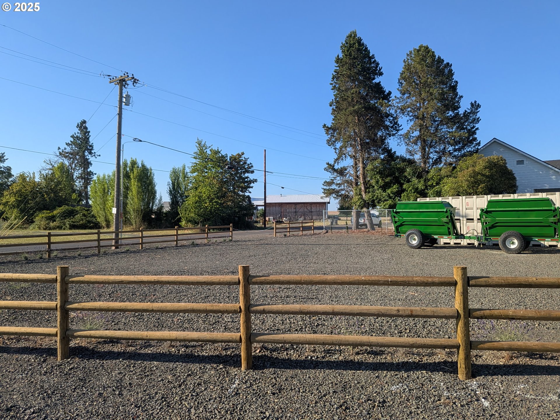 7495 Perrydale Road Amity, OR 97101 - Photo 12 of 21 a view of a yard with a bench