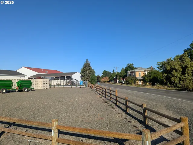 a view of a city street from a balcony
