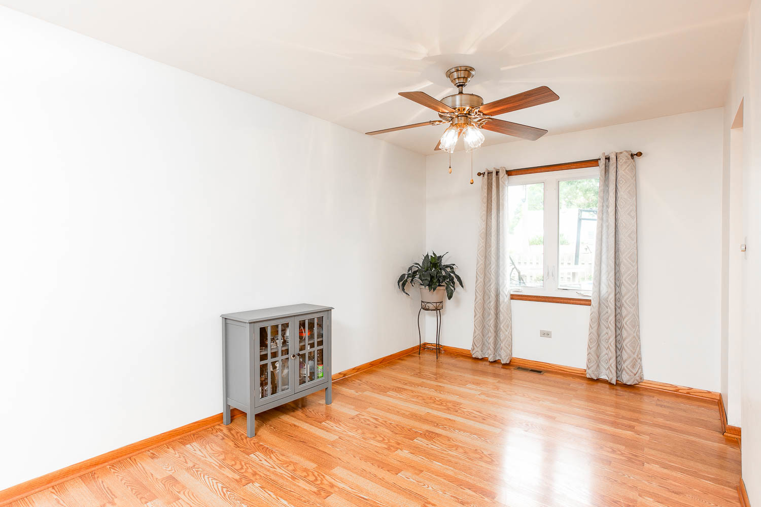 17936 Dekker Avenue Lansing, IL 60438 - Photo 13 of 35 a bedroom with a bed and a window
