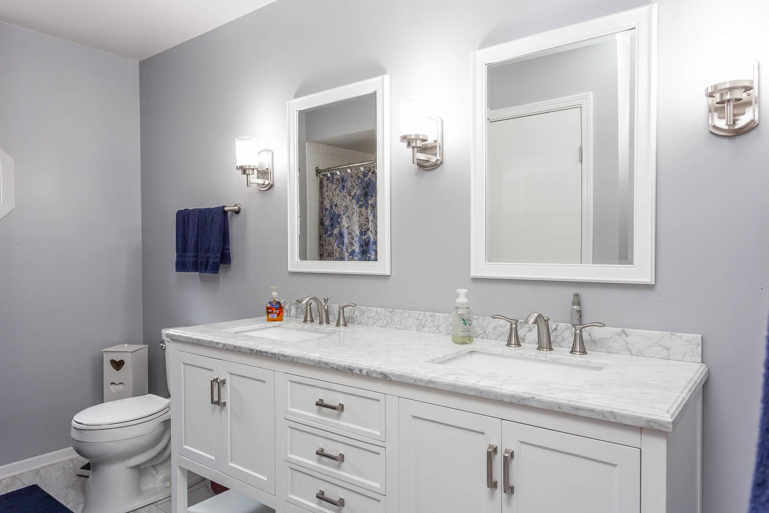 17936 Dekker Avenue Lansing, IL 60438 - Photo 26 of 35 a bathroom with a granite countertop toilet sink and mirror