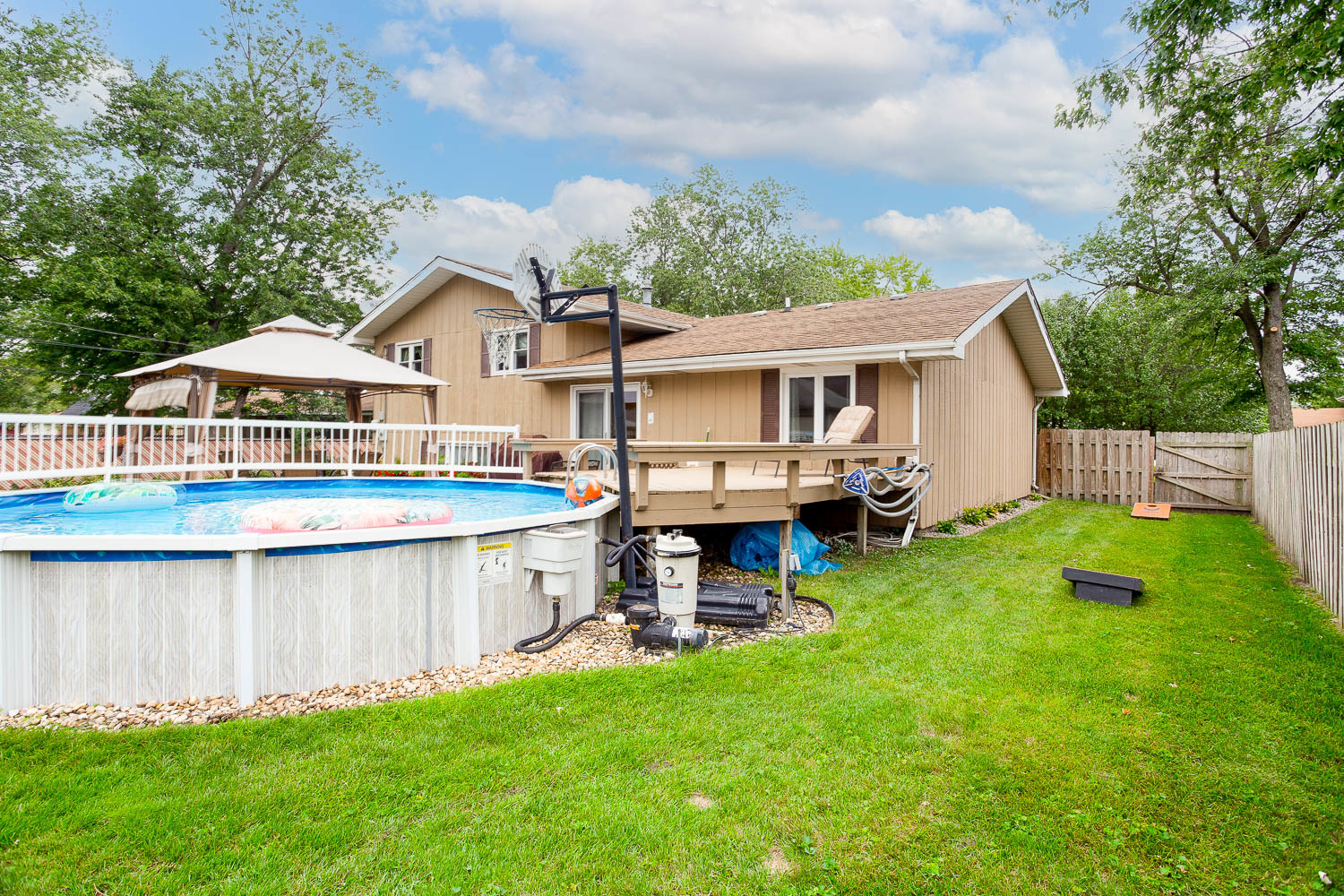 17936 Dekker Avenue Lansing, IL 60438 - Photo 9 of 35 a view of a house with a yard and sitting area