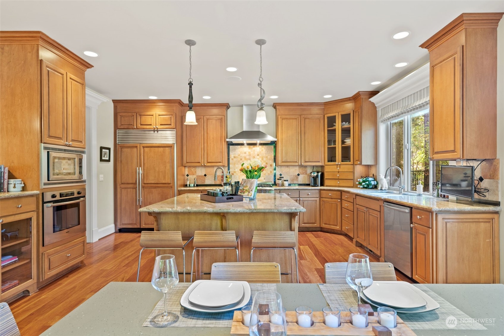 10707 226th Street Southwest Edmonds, WA 98020 - Photo 11 of 39 a large kitchen with a table and chairs