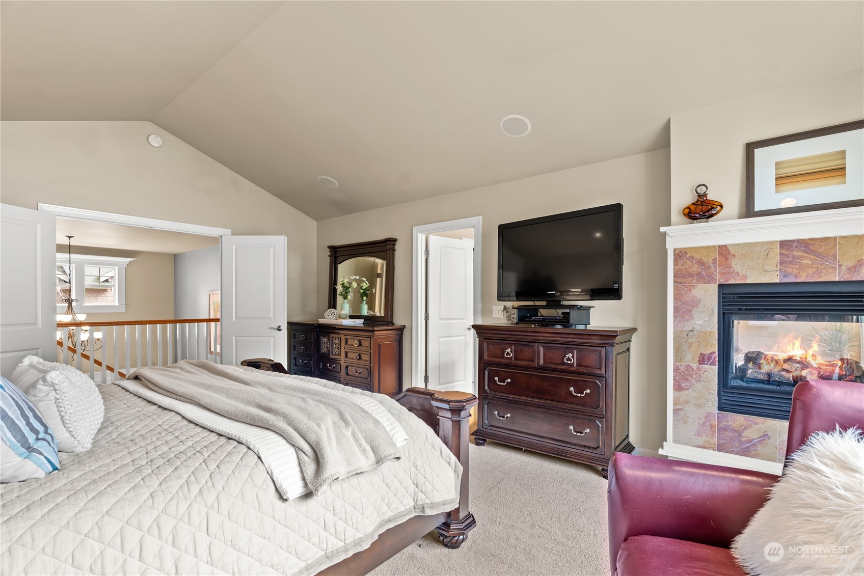 10707 226th Street Southwest Edmonds, WA 98020 - Photo 23 of 39 a bedroom with a bed and a flat screen tv