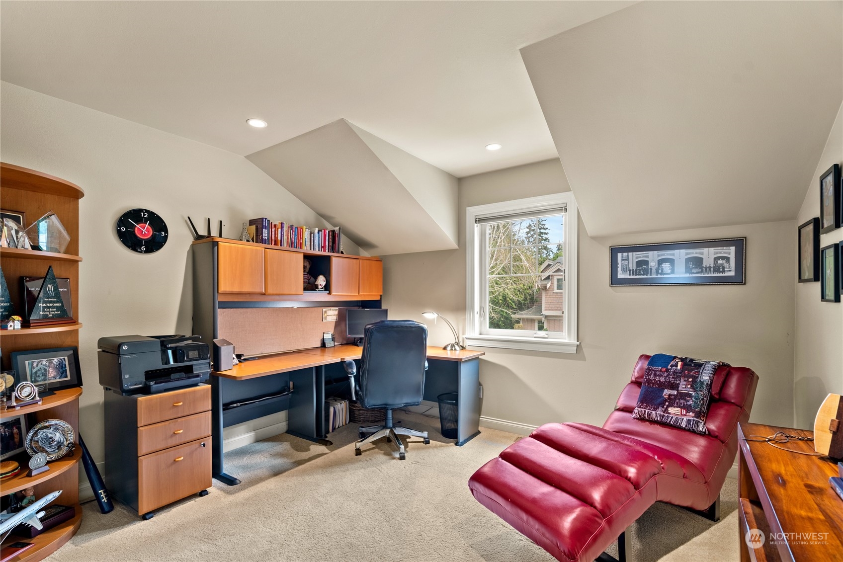 10707 226th Street Southwest Edmonds, WA 98020 - Photo 28 of 39 a room with furniture a bookshelf and a window