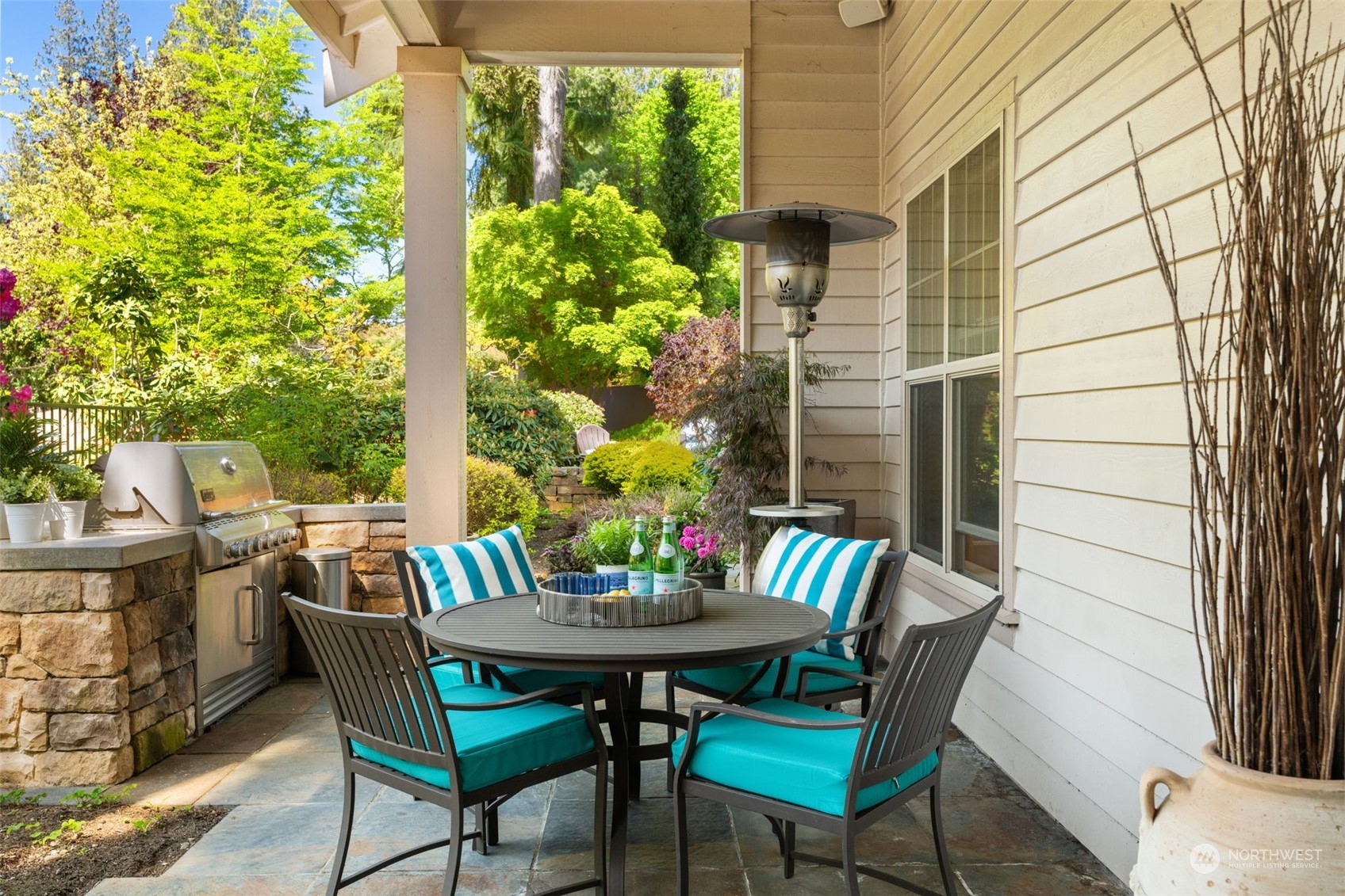 10707 226th Street Southwest Edmonds, WA 98020 - Photo 38 of 39 a view of an outdoor dining space with a table and chairs