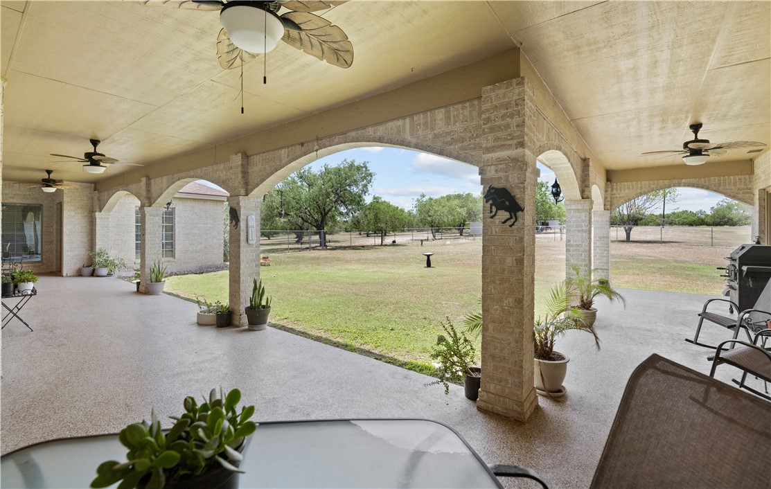 5763 Santa Isabelle Drive Robstown, TX 78380 - Photo 21 of 26 a view of a living room and floor to ceiling window