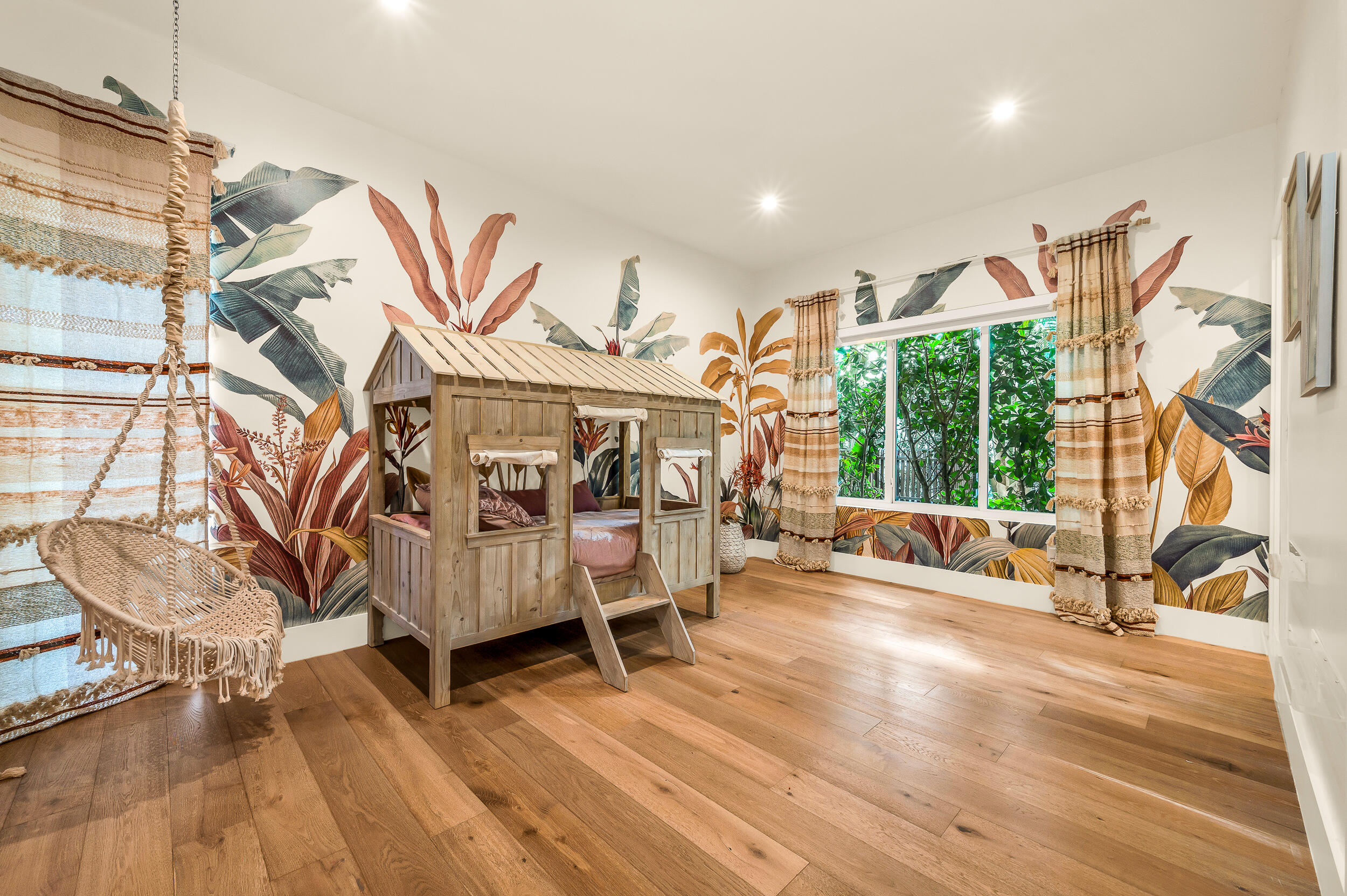 4740 Bay Point Road Miami, FL 33137 - Photo 14 of 27 a bedroom with furniture and a large window