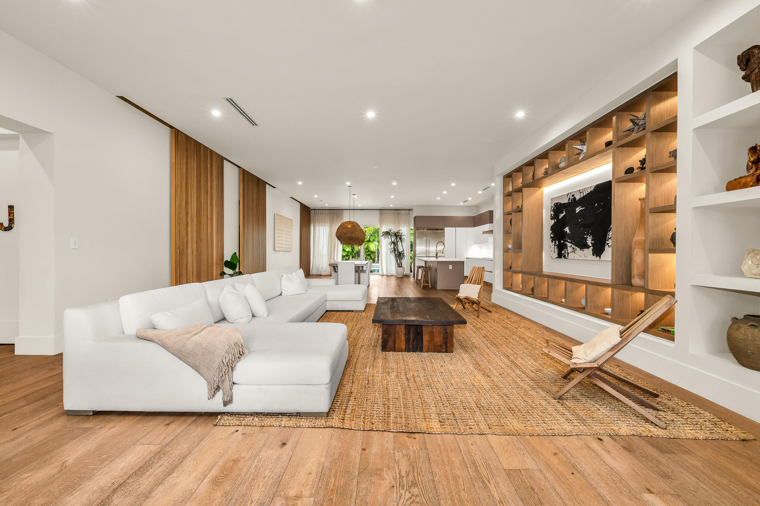 4740 Bay Point Road Miami, FL 33137 - Photo 3 of 27 a living room with furniture and a flat screen tv