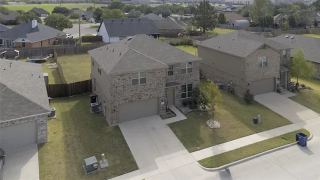 an aerial view of residential house with outdoor space
