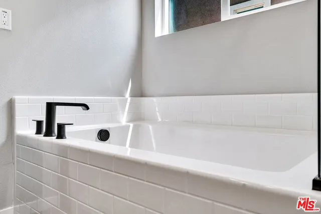 a bathroom with a bathtub