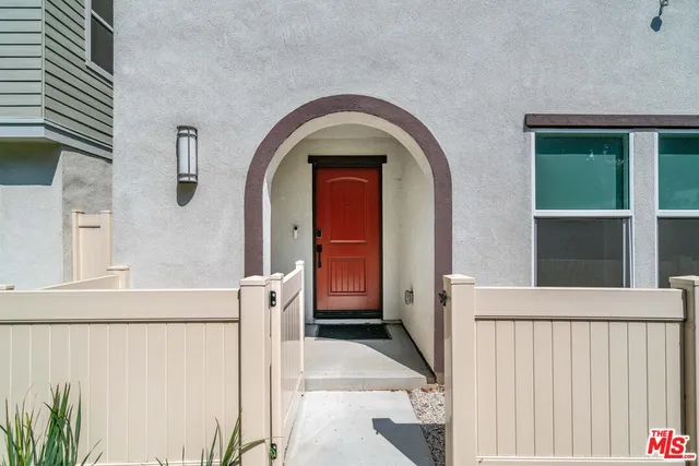 a house view with a garden space