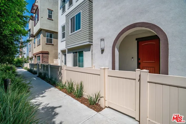 a view of a building with a street