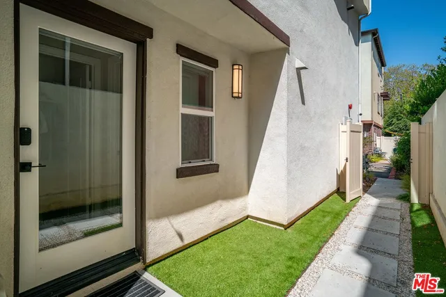 a view of a swimming pool with a lounge chairs