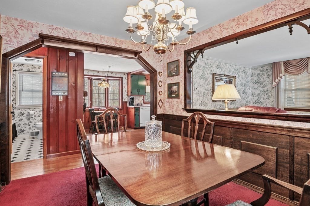 64 Timothy Circle Springfield, MA 01119 - Photo 11 of 34 a dining room with furniture a chandelier and wooden floor