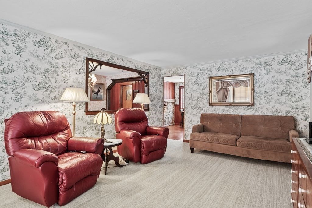 64 Timothy Circle Springfield, MA 01119 - Photo 13 of 34 a living room with furniture and a couch