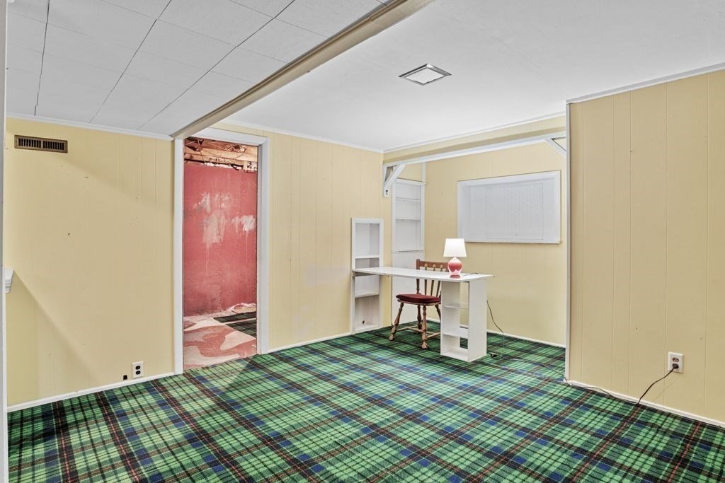 64 Timothy Circle Springfield, MA 01119 - Photo 23 of 34 a room with a table and a chair