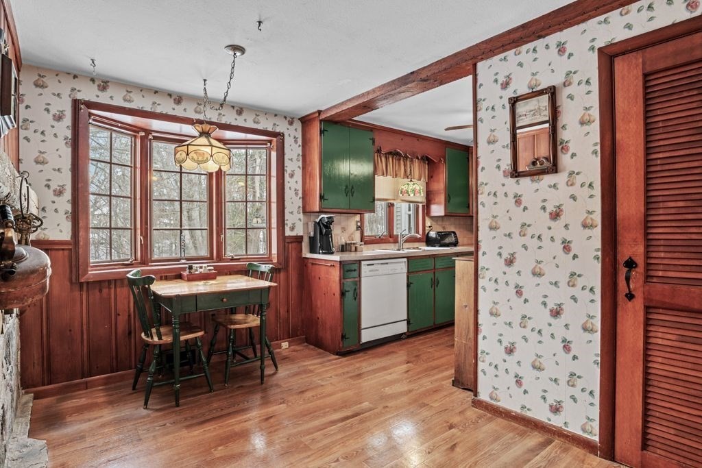64 Timothy Circle Springfield, MA 01119 - Photo 8 of 34 a kitchen with a table and chairs in it