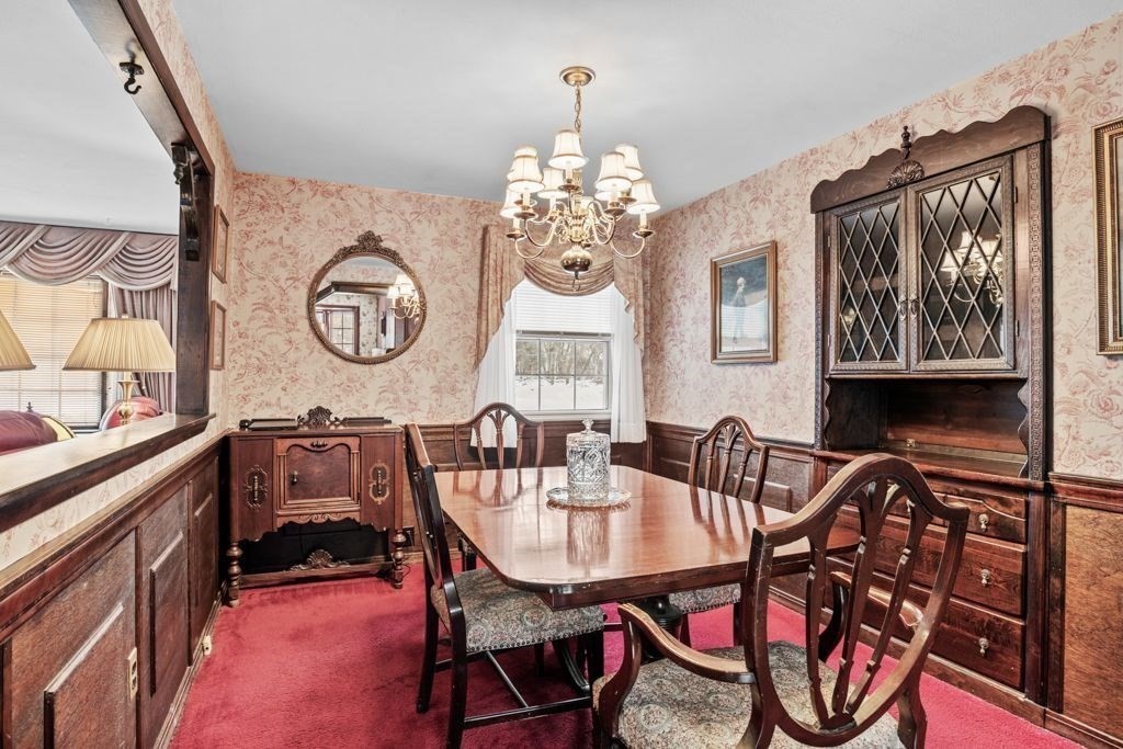 64 Timothy Circle Springfield, MA 01119 - Photo 9 of 34 a view of a dining room with furniture and chandelier