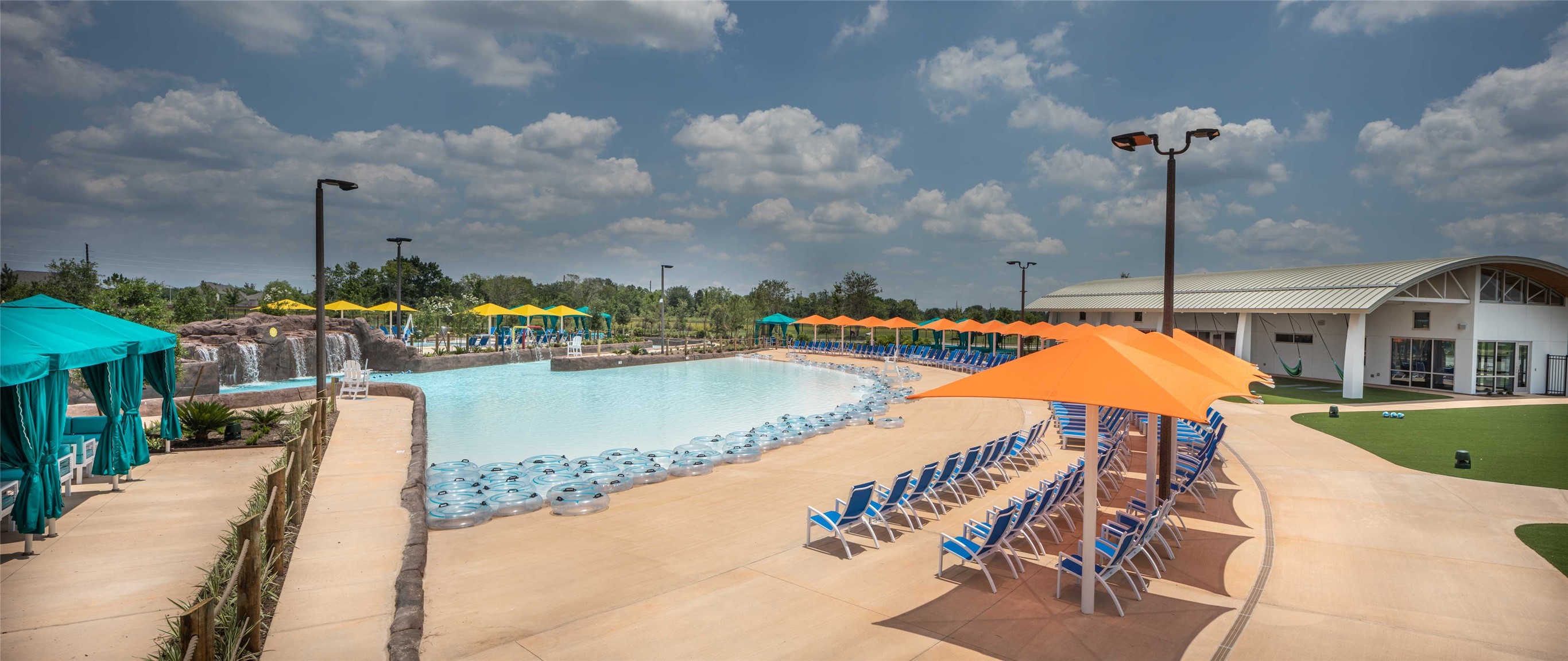 8615 Blue Grotto Lane Manvel, TX 77578 - Photo 20 of 32 a view of a swimming pool with a lake view