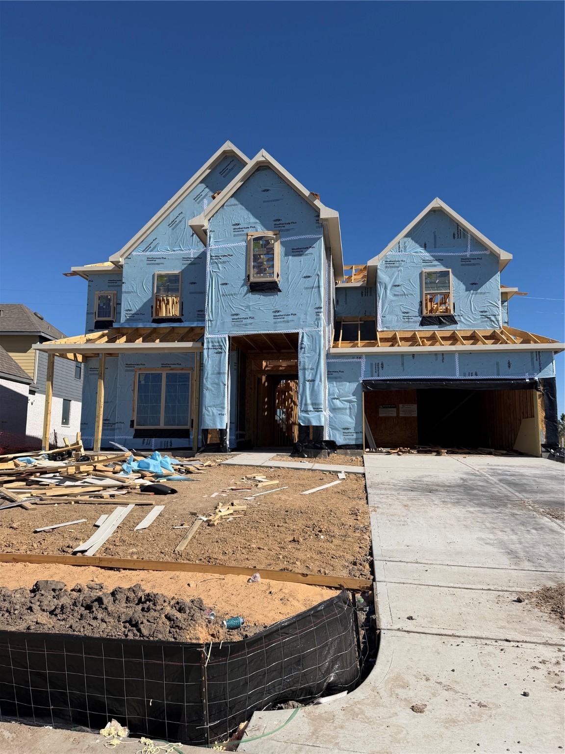 8615 Blue Grotto Lane Manvel, TX 77578 - Photo 3 of 32 a front view of a house with a yard
