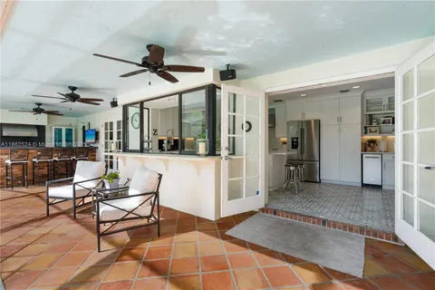 a view of a backyard with a swimming pool