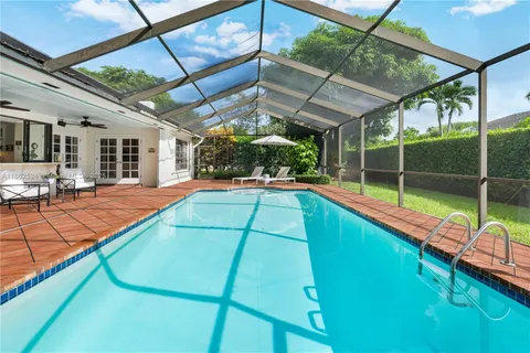 a view of a backyard with a garden and plants