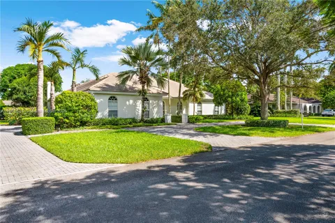 a view of a swimming pool with an outdoor space and seating area