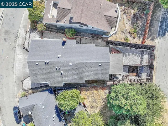 a view of a house with a yard and garage