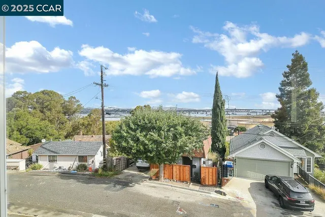 a view of a street with a building in the background
