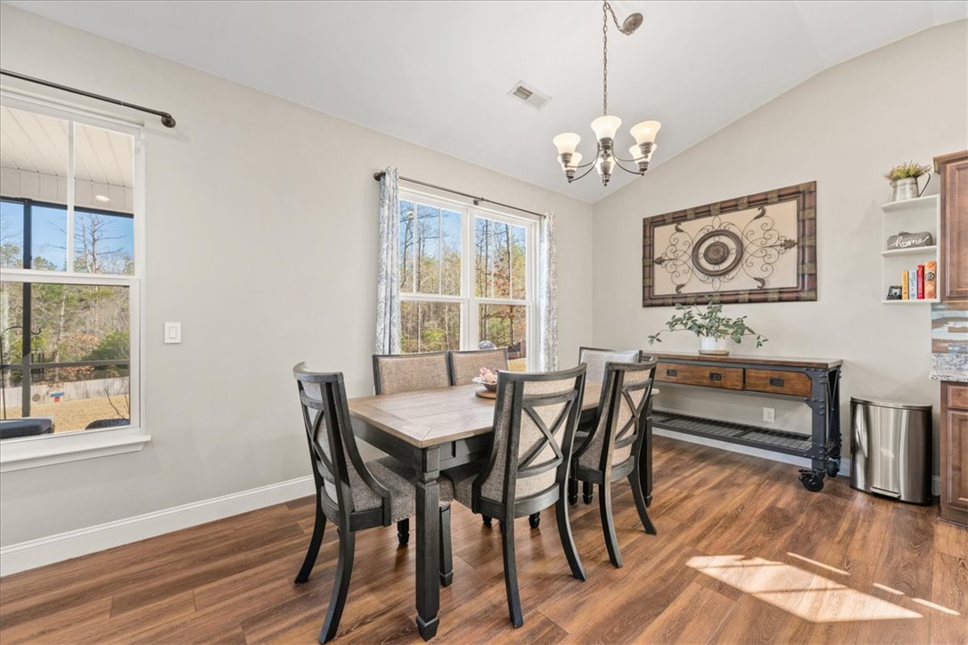 104 Inlet Pointe Drive Anderson, SC 29625 - Photo 15 of 50 This bright dining area features an airy ambiance, perfect for meals and gatherings.