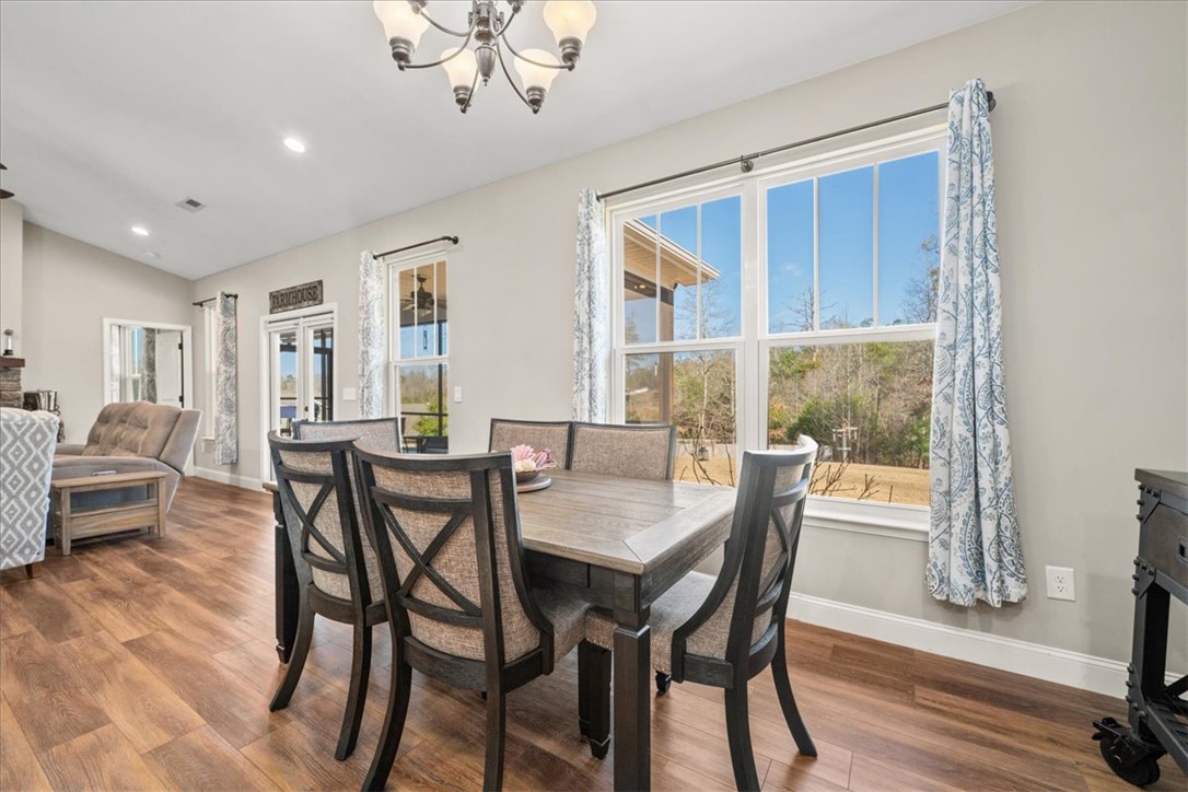 104 Inlet Pointe Drive Anderson, SC 29625 - Photo 16 of 50 This spacious dining area features warm flooring and abundant natural light.