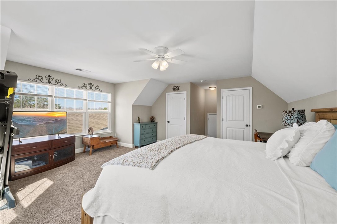 104 Inlet Pointe Drive Anderson, SC 29625 - Photo 36 of 50 Bright and airy, this bedroom offers comfort and ample natural light.