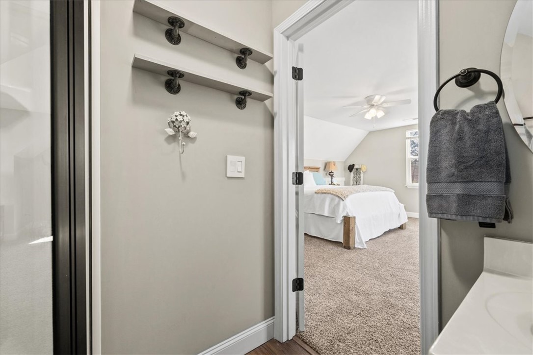 104 Inlet Pointe Drive Anderson, SC 29625 - Photo 39 of 50 This cozy bedroom features a sloped ceiling and a plush carpet, perfect for peaceful retreats.