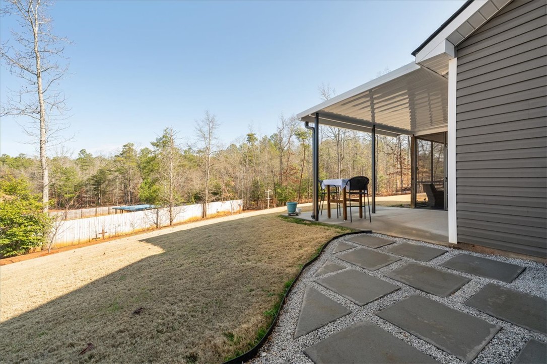 104 Inlet Pointe Drive Anderson, SC 29625 - Photo 42 of 50 Enjoy outdoor living with this spacious patio, perfect for entertaining.