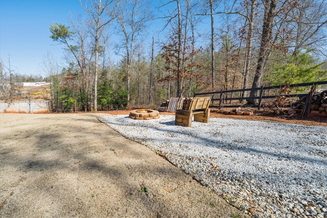 104 Inlet Pointe Drive Anderson, SC 29625 - Photo 44 of 50 This private yard provides a dedicated space for outdoor gatherings and relaxation.