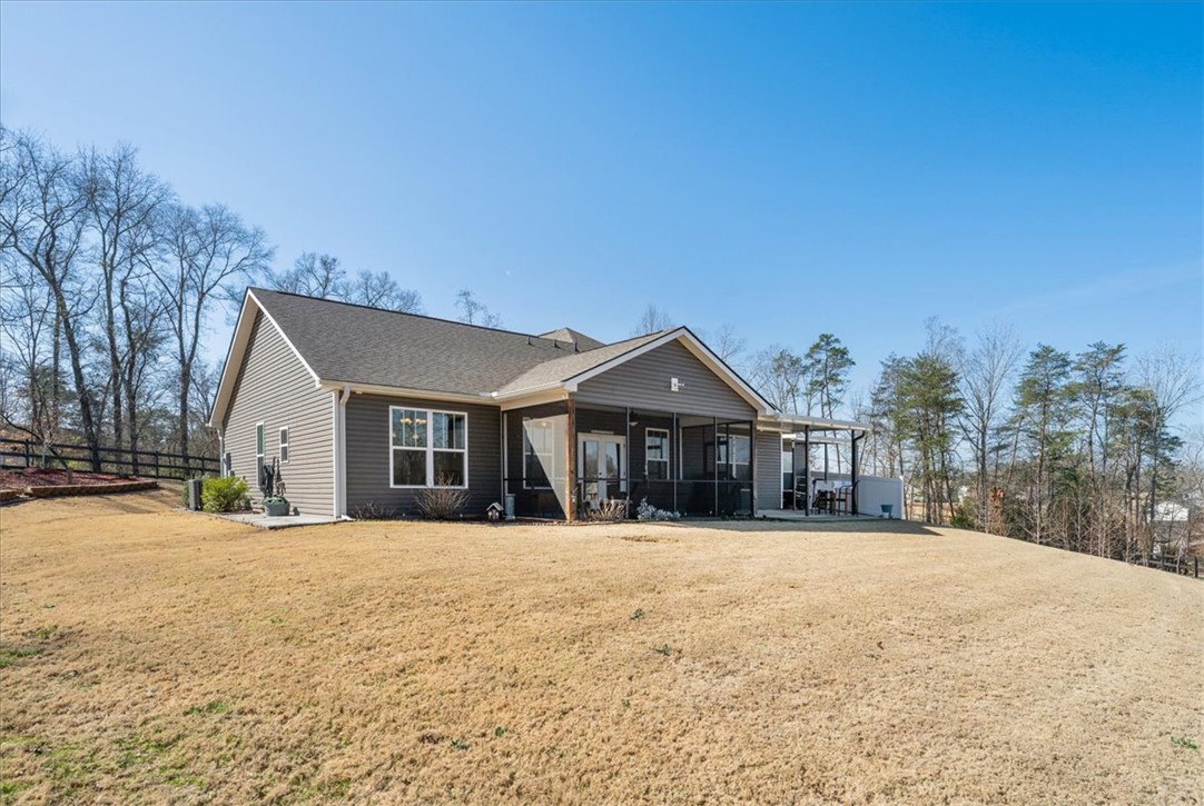 104 Inlet Pointe Drive Anderson, SC 29625 - Photo 47 of 50 This home features a well-maintained exterior and a screened porch perfect for outdoor living.
