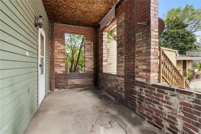 a car parked in front of a house