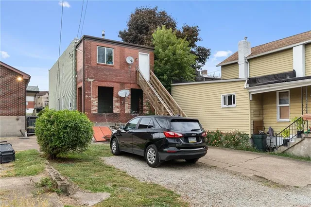front view of a building with a street