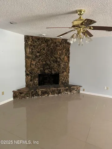a kitchen with appliances and cabinets