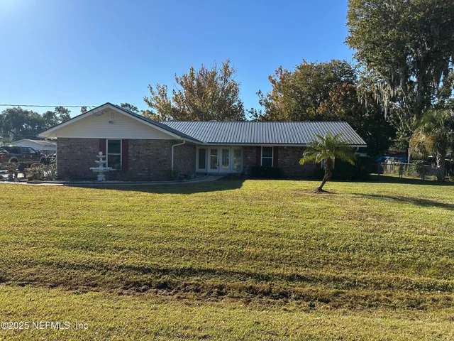 a view of a house with a swimming pool
