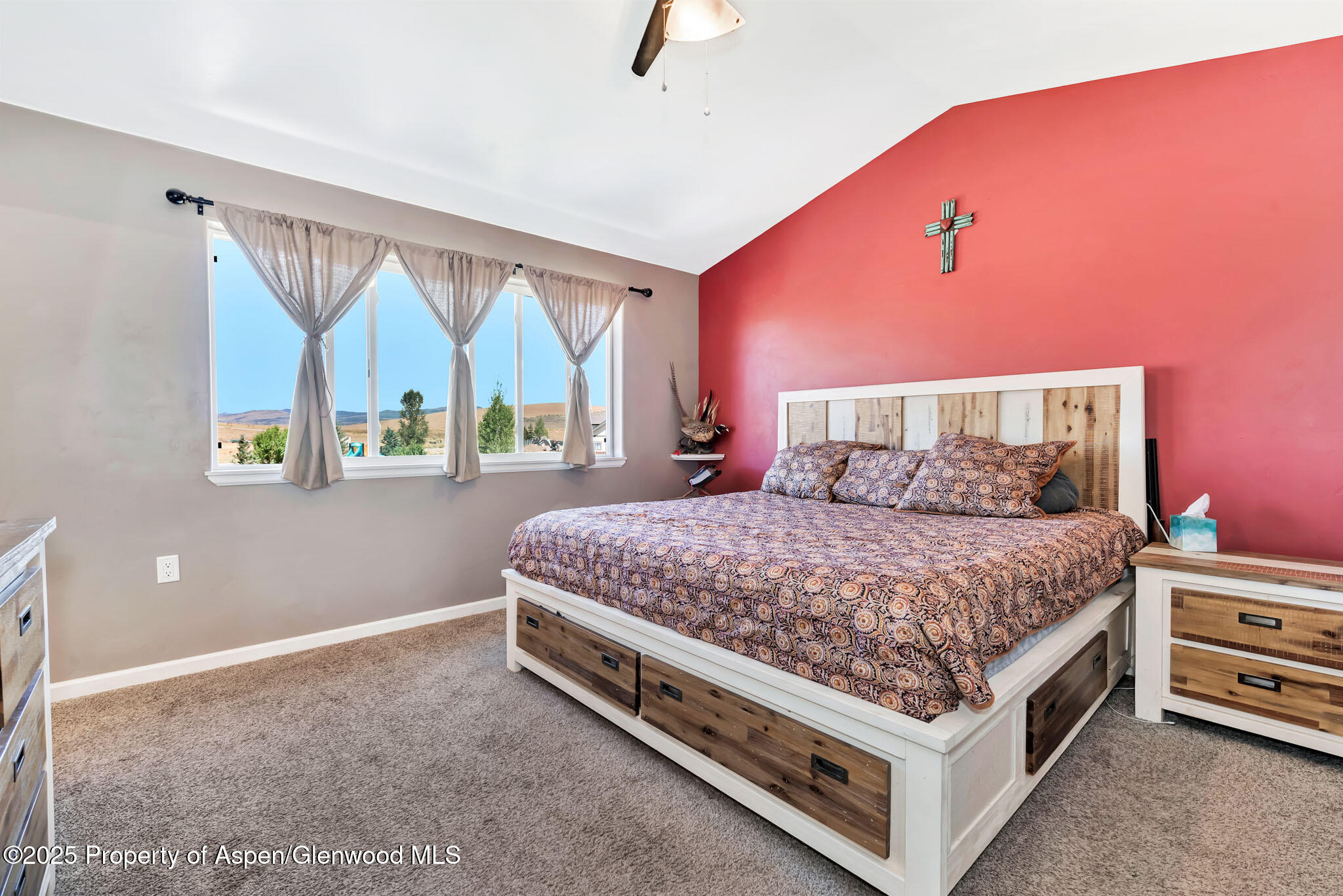 875 Dry Creek Road Hayden, CO 81639 - Photo 20 of 40 a bed room with a bed and a large window
