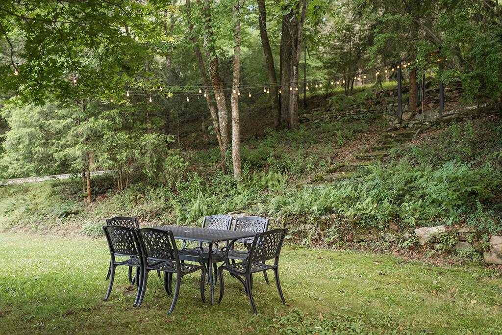 328 Black Ankle Creek Road Cherry Log, GA 30522 - Photo 83 of 103 a view of an outdoor space with a table and chairs