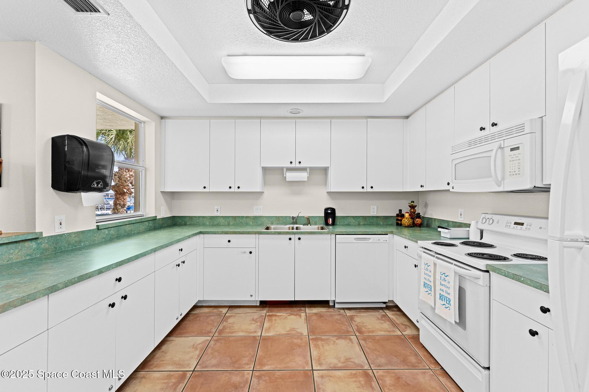 102 Riverside Drive, Unit 605 Cocoa, FL 32922 - Photo 50 of 84 Clubhouse Kitchen Views