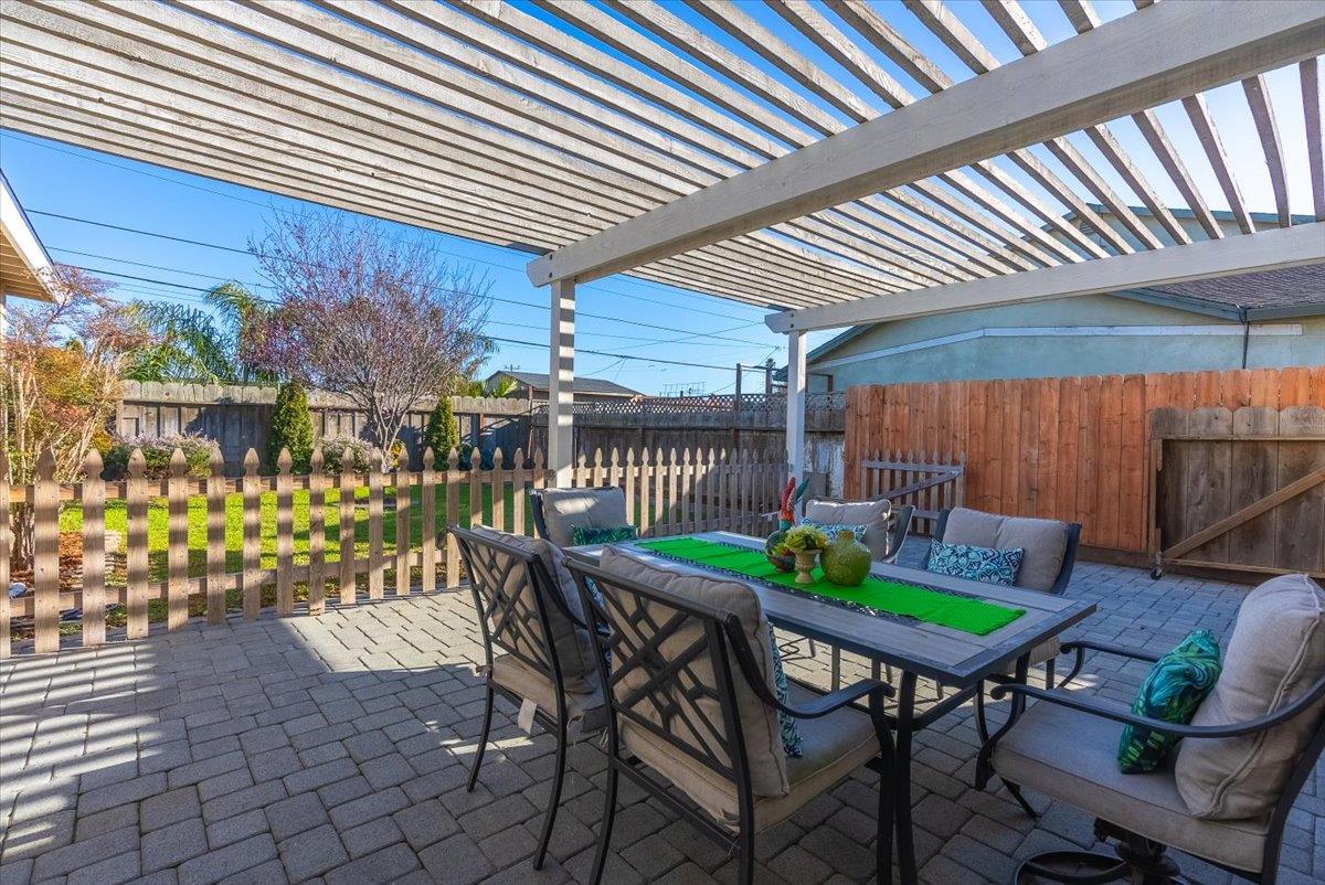 701 Cornell Avenue Salinas, CA 93901 - Photo 26 of 40 a table and chairs with potted plants