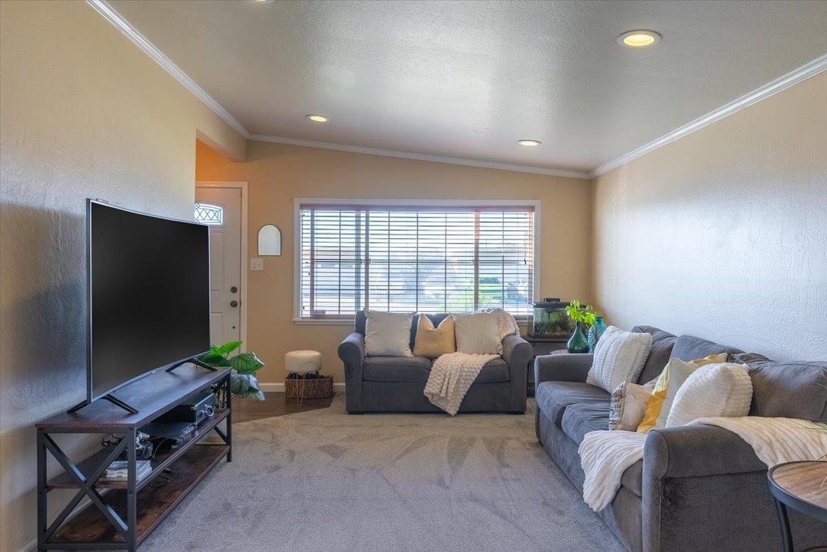 701 Cornell Avenue Salinas, CA 93901 - Photo 6 of 40 a living room with furniture a flat screen tv and a window