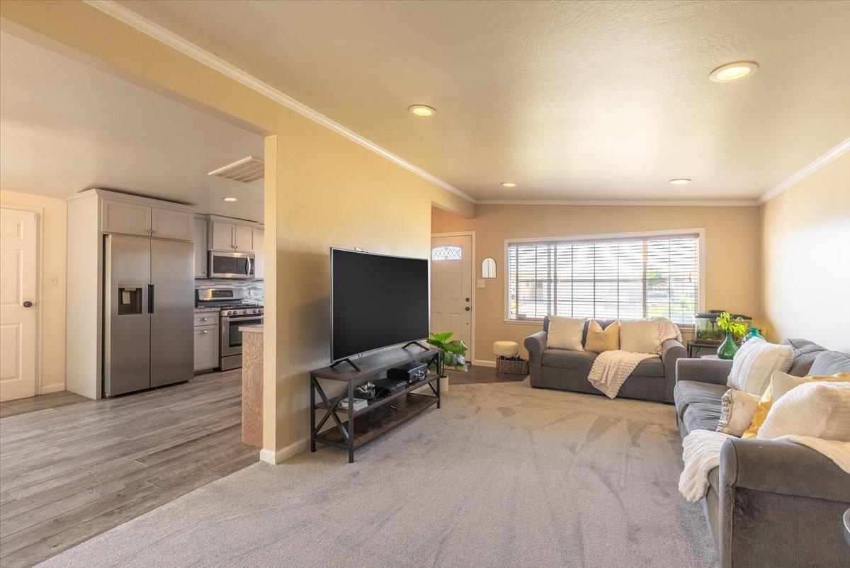 701 Cornell Avenue Salinas, CA 93901 - Photo 8 of 40 a living room with furniture and a flat screen tv