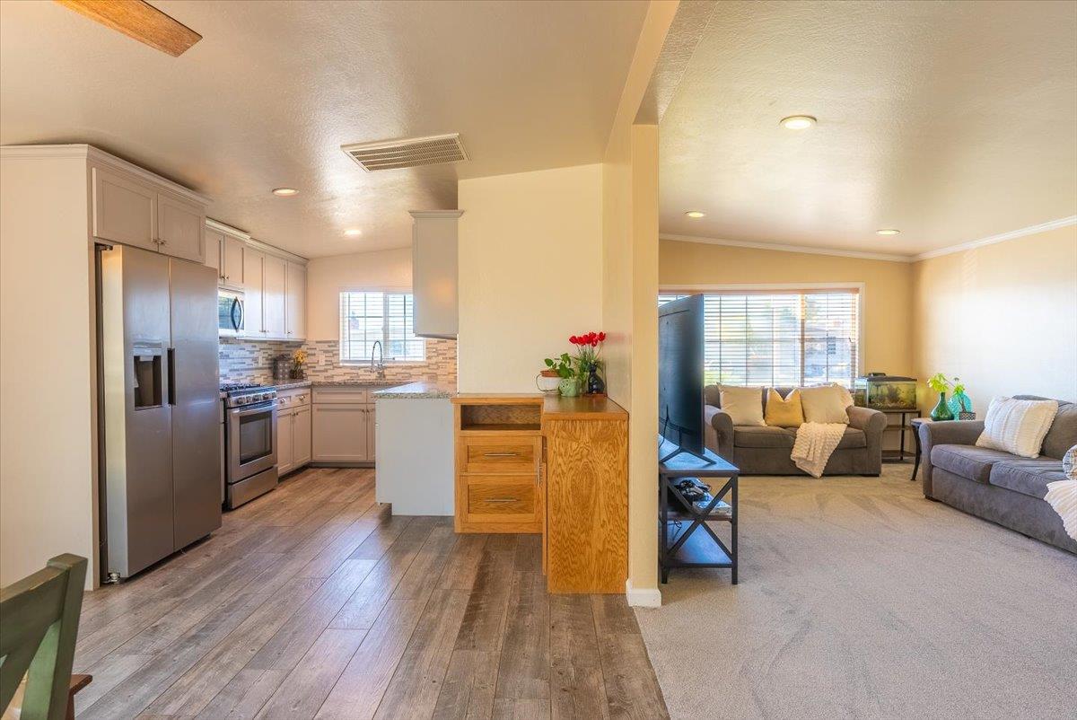 701 Cornell Avenue Salinas, CA 93901 - Photo 9 of 40 a living room with furniture and kitchen view