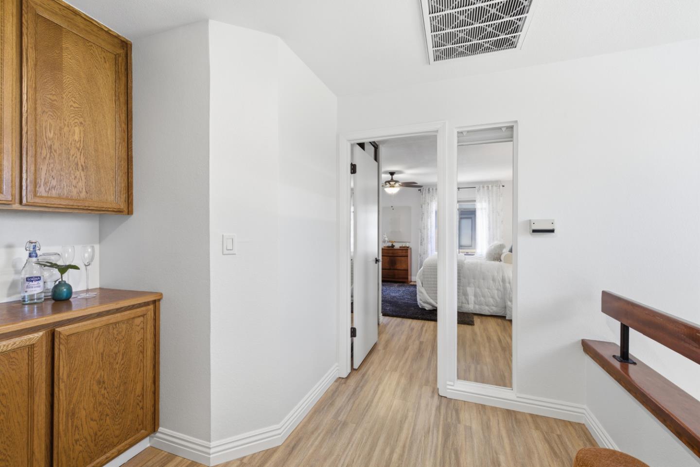 1669 Geary Road Walnut Creek, CA 94597 - Photo 29 of 39 a very nice looking room with wooden floor and a bathroom